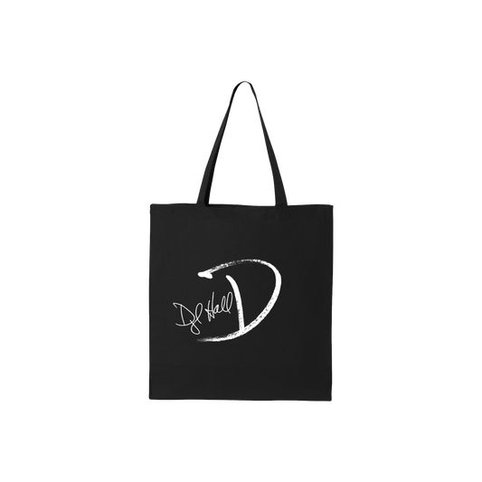 A black cotton tote bag with white text graphic that appears to be a signature.