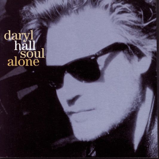 CD cover featuring a monochrome image of a person with sunglasses on, with the artist name 'daryl hall' and album title 'soul alone' prominently displayed.